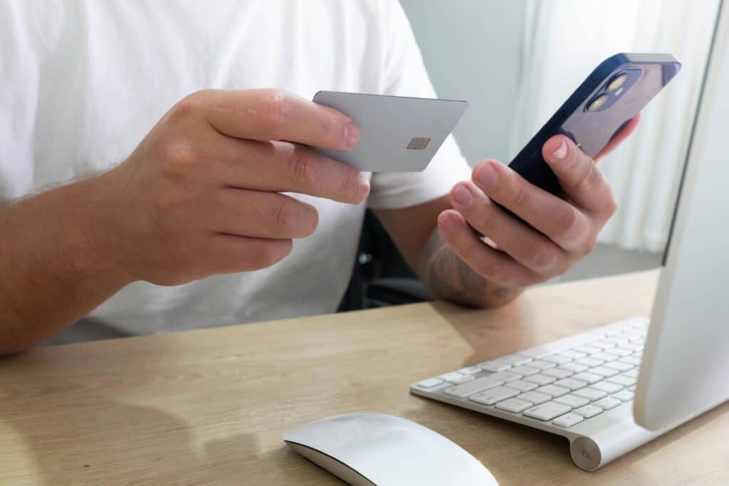 person buying something online from their cell phone